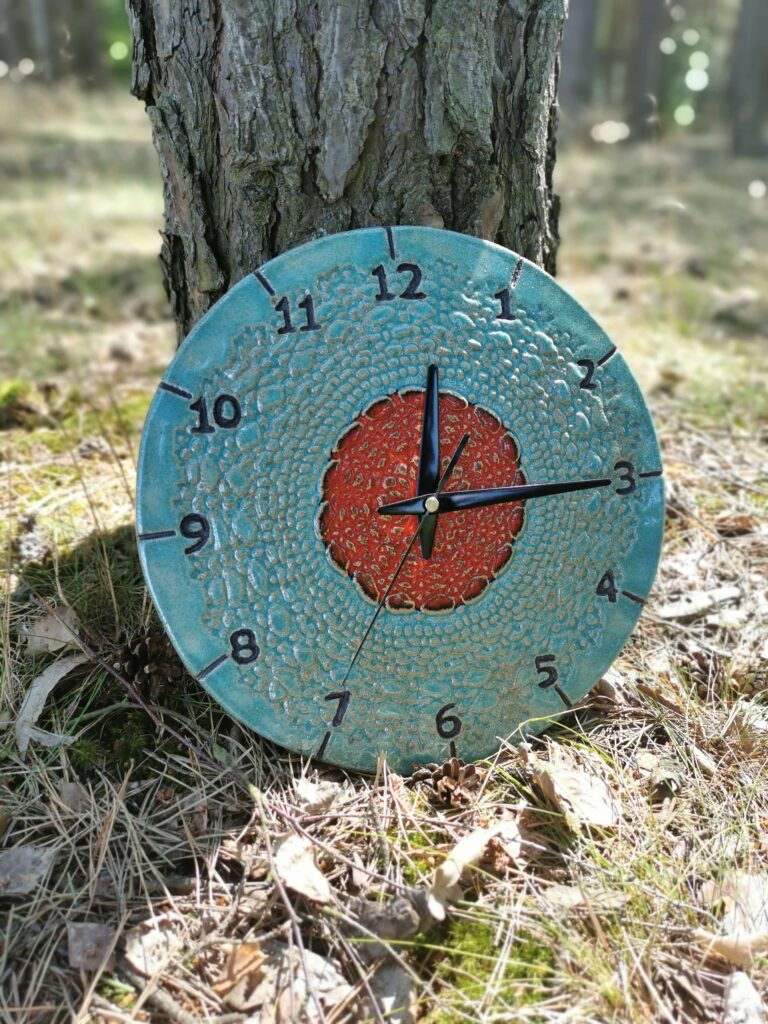 niebieski zegar ścienny eweolo ludowy